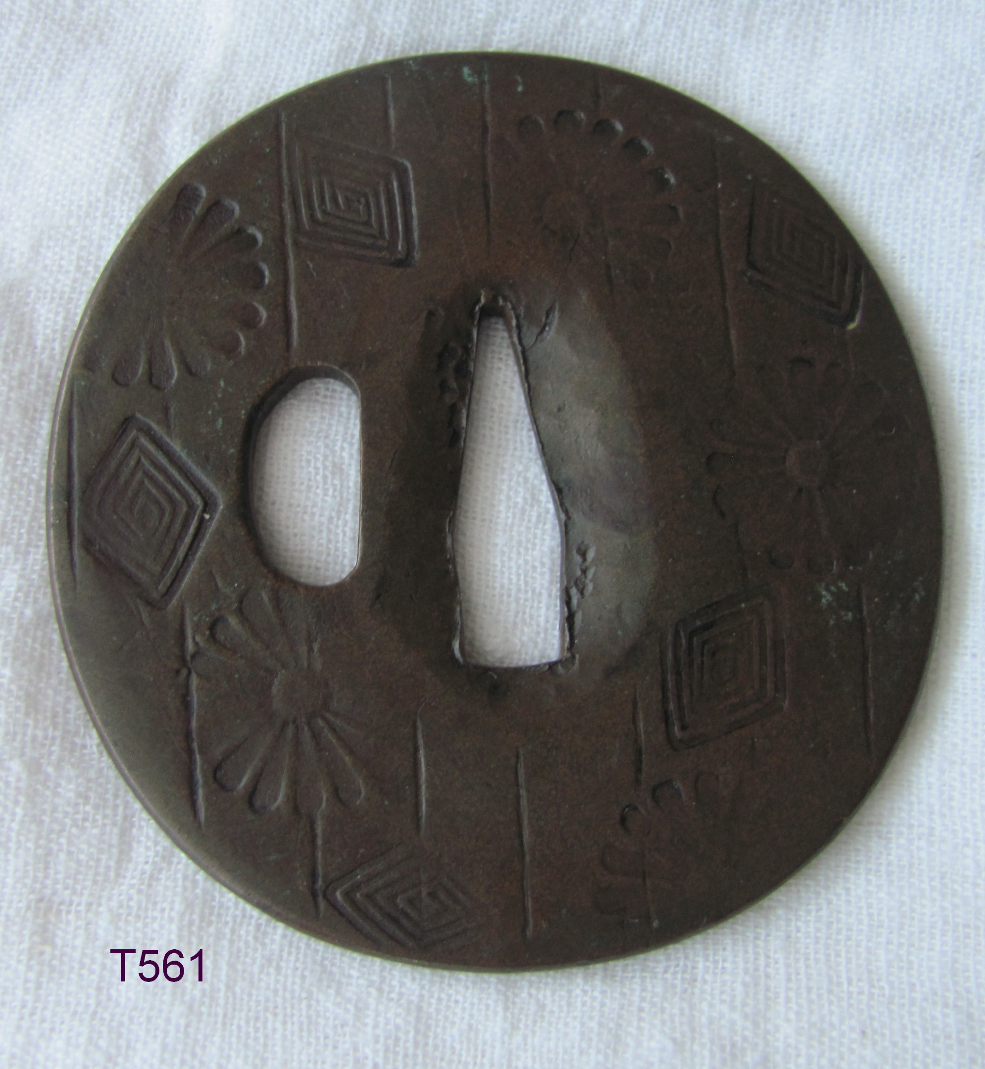 T561. Stamped Yamagane Tsuba